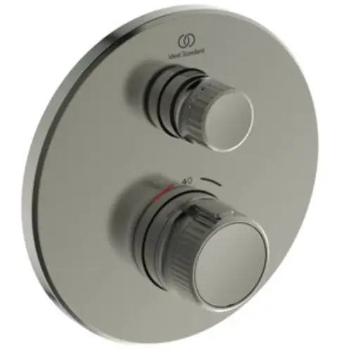Brausethermostat mit zwei drehbaren Reglern zur Temperatureinstellung, aus der Ideal Standard Serie, auf runder Wandplatte in silberner Oberfläche.
